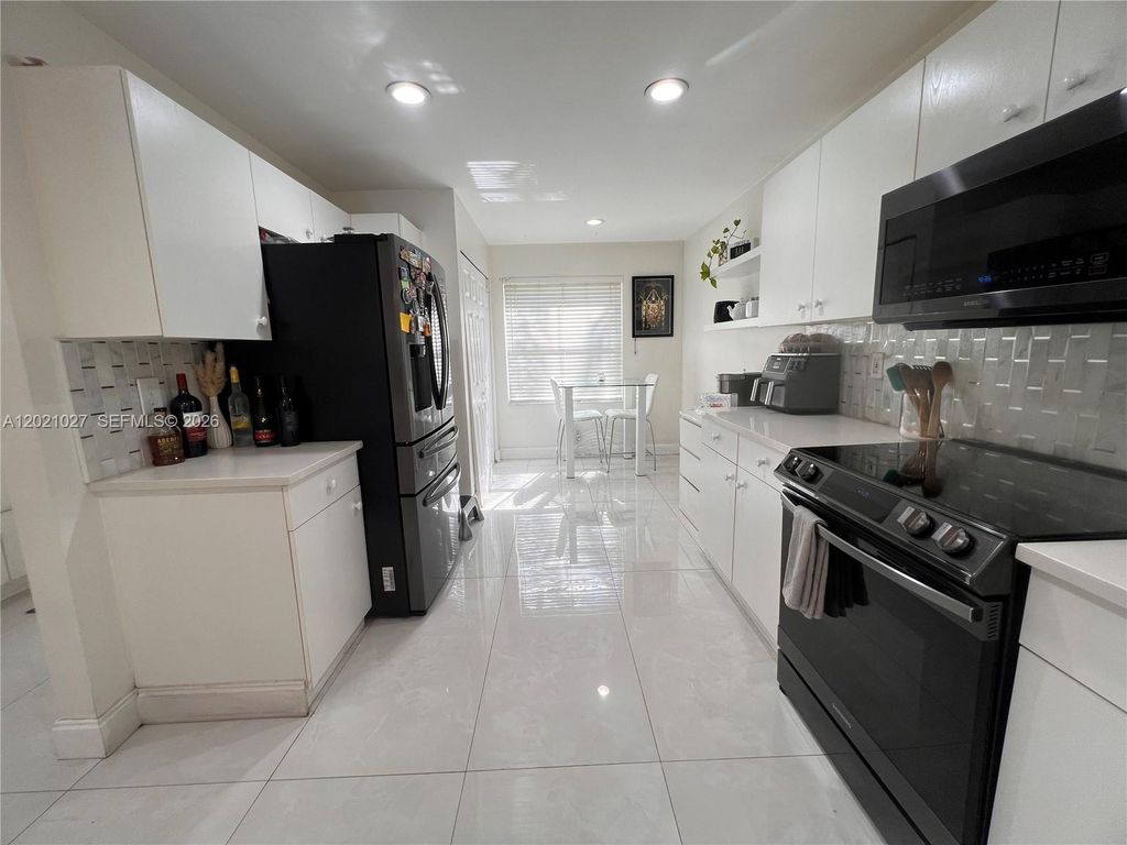 Photo of 1590 Orion Ln, Weston, FL 33327 (MLS # A12021027)