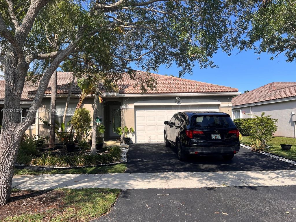 Photo of 1590 Orion Ln, Weston, FL 33327 (MLS # A12021027)