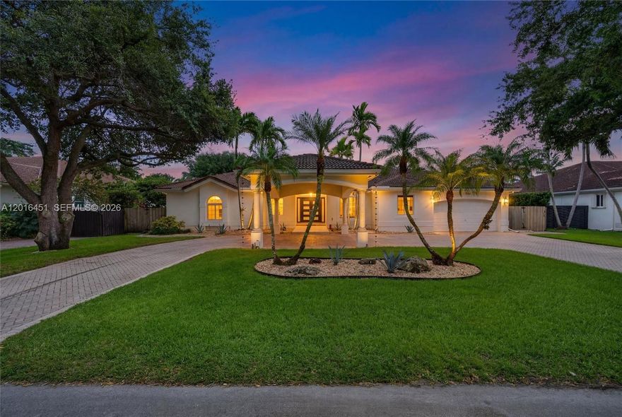 Guard-gated Oak Ridge Falls! Spacious 5BR/4.5BA single-story pool home on a 15,000 sq ft lot with 3,563 sq ft under air and exceptional indoor-outdoor living. Extensive upgrades include full impact windows/doors, travertine pavers (front porch, patio & walkways), and a resort-style saltwater pool with spa, heater, beach ledge, Jewelscapes glass-bead Diamond Brite finish, plus vacuum line & new vacuum. Enjoy a pergola-covered outdoor kitchen with granite counters, 5-burner grill, side burner, rotisserie, refrigerator, bar ledge, fans and storage, plus an additional patio sink/storage/refrigerator. New Carrier variable high-efficiency A/C w/ UV light, 2025 water heater, custom shades/shutters, DC fans, and professional landscaping.
