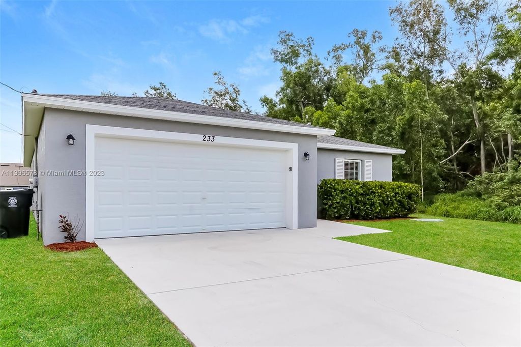 Photo of 233 SW Bedford Rd, Port Saint Lucie, FL 34953 (MLS # A11396578)