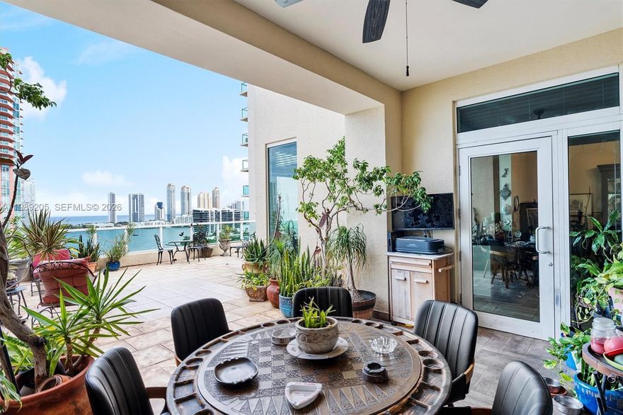 Stunning 2-story corner penthouse with panoramic views of the ocean, Intracoastal & Sunny Isles skyline. Over 2,497 SF interior plus 1,000 SF terrace for outdoor living. Features 12 ft ceilings, wood & porcelain floors, open kitchen, walk-in closets, laundry room, and large storage. Exclusive gated community with marina, walking paths, spa, gym, 2 pools, 4 tennis courts, concierge, valet & 24-hr security. Includes 2 garage spaces. Prime Aventura location.
