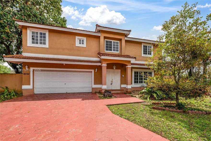 POOL - CUL DE SAC - TWO CAR GARAGE. Welcome to 8724 NW 189th Terrace, this 4 bedroom, 2 bathroom cul-de-sac home is ready for a new owner! As you walk in, you are greeted with the first of two living rooms. The kitchen, while dated, is a perfect canvas to renovate and make your dream kitchen. It flows nicely to the pool, which has a florida room overlooking the pool. Upstairs, the master bedroom suite is oversized and has an abundance of closet space(with a walk in closet and extra space). The master bathroom is expansive and features his & her sinks and a soaking tub. The pool area is perfect for relaxation or entertaining. There is a small cottage off the side of the pool as well. Schedule a showing today!