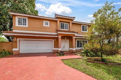 Photo of 8724 NW 189th Ter, Hialeah, FL 33018 (MLS # A11997400)