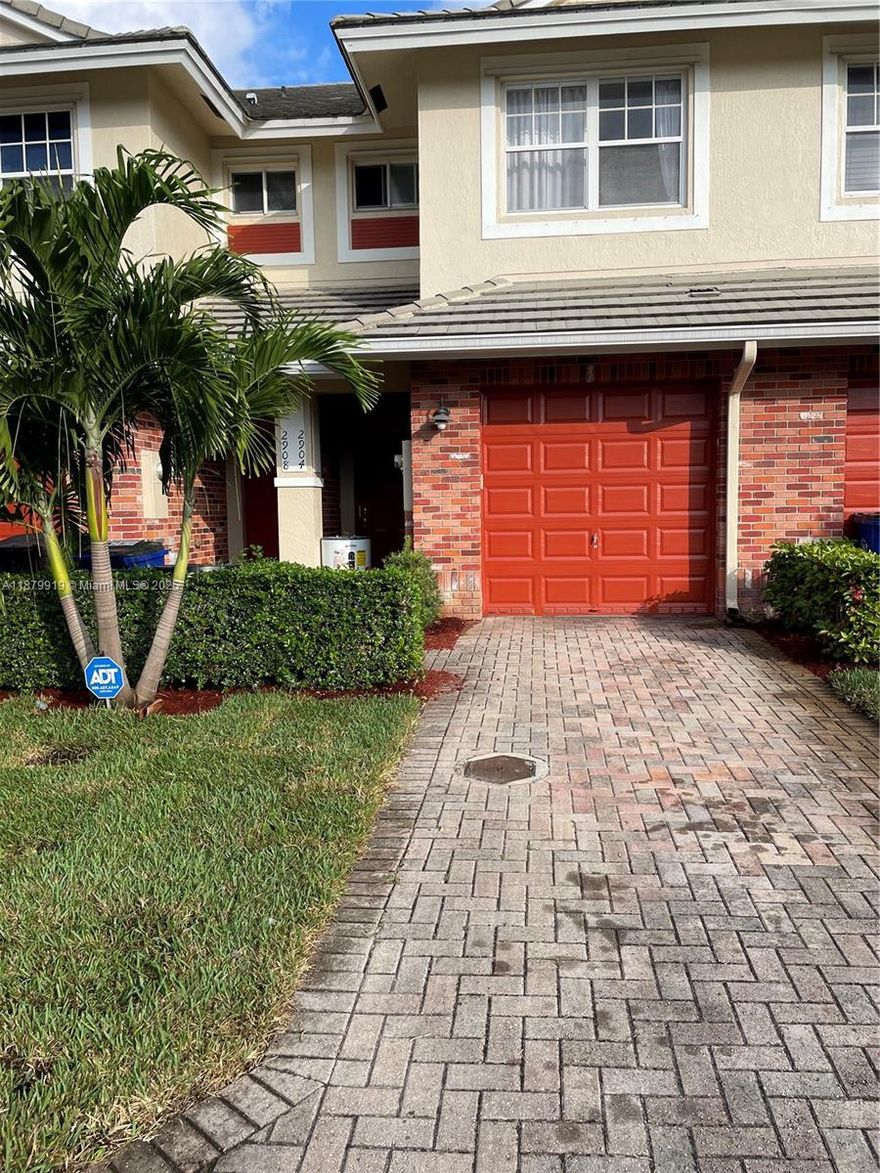 Gated 2/2.5 town home in the Heart of Lauderdale Lakes located in the Carriage Homes at Bentley Park. Affordable and Cozy featuring updated kitchen with modern appliances along with washer and dryer . The property is located close to Stores, Parks, Schools, Highways and churches. Easy approval, don't hesitate to make this your home