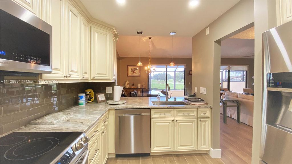 Photo of 437 Prestwick Ln, Palm Beach Gardens, FL 33418 (MLS # A11428991)