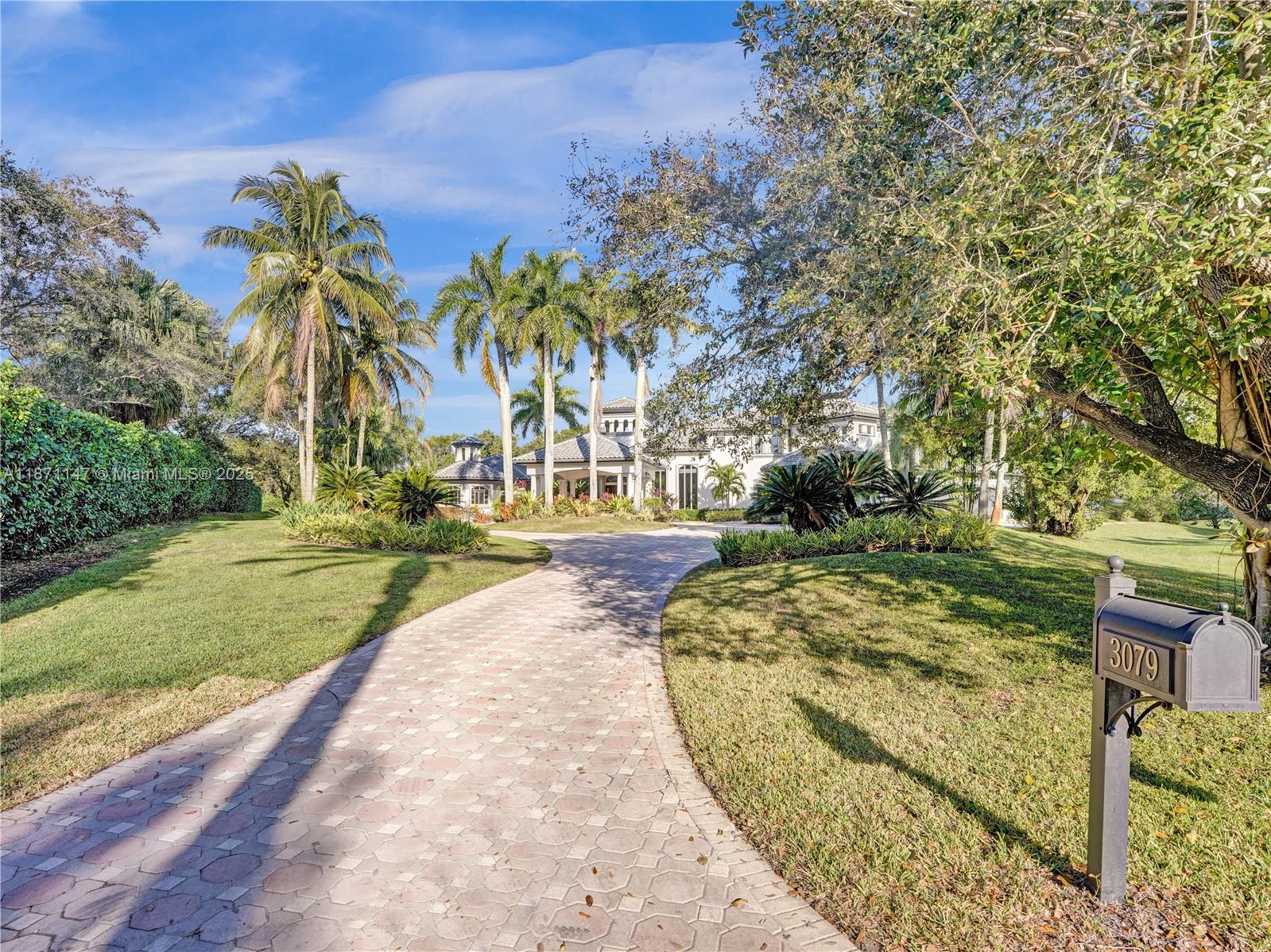 Presenting a truly exceptional, one-of-a-kind residence in the prestigious Windmill Ranch Estates. Situated on a sprawling 1.53-acre cul-de-sac lot with a tennis court, this magnificent estate offers the utmost in luxury & privacy. 6 Bedrooms (all ensuite) with master suite on the first floor, 6 1/2 baths plus office/den, exercise rm, & a spacious loft. Impeccable attention to detail with soaring ceilings & an open layout that creates an ideal space for both relaxation & entertaining. Stunning kitchen with top-of-the-line appliances & large center island, formal dining rm with a butler’s pantry, living room with fireplace & breathtaking views of the backyard, expansive patio areas & pool with spa. Grand circular driveway, with porte-cochere & a 4-car garage. New Roof!