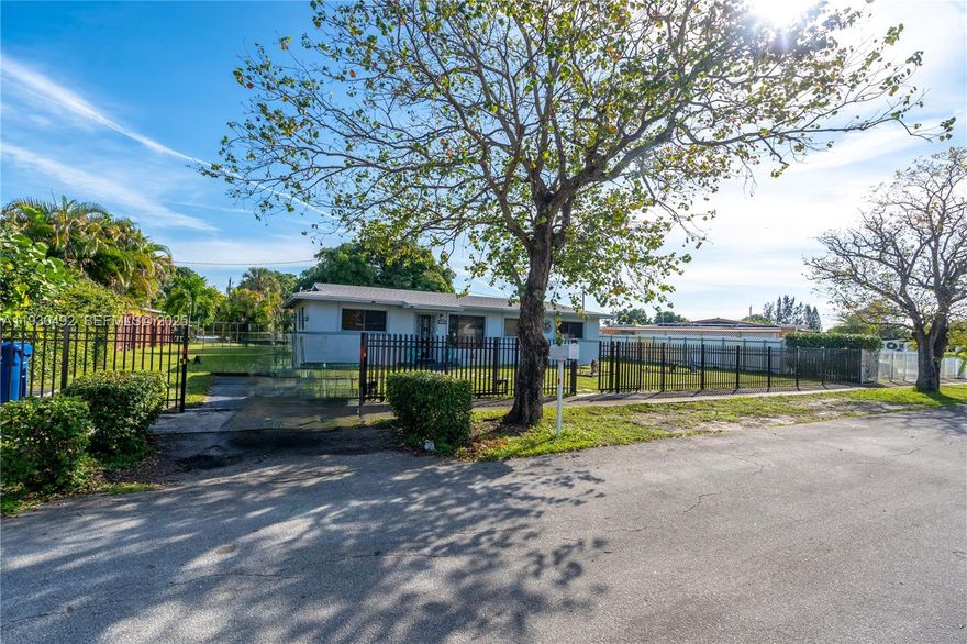 Welcome home to this 4BR/2BA single-family residence in Miami Gardens. From the moment you walk in, you’ll appreciate the spacious open floor plan and the easy flow of tile flooring throughout. The home features a new roof, updated kitchen and bathroom, and a newer AC unit, bringing comfort, style, and peace of mind together.
Step outside to a generous fenced yard with a new security front gate, offering both privacy and convenience. The stand-alone covered back patio is perfect for family gatherings, relaxing afternoons, or weekend barbecues. For a true touch of South Florida charm, enjoy your very own mature mango tree in the backyard.
Located close to major highways, shopping, dining, local parks, and Hard Rock Stadium, this home combines comfort and convenience in one great package. Warm, inviting, and move-in ready, this is a wonderful place to create new memories. SIGHT UNSEEN OFFERS WILL NOT BE CONSIDERED.