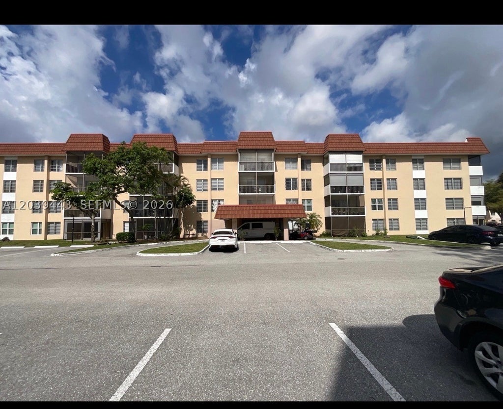 Photo of 4152 Inverrary Dr #409, Lauderhill, FL 33319 (MLS # A12039443)