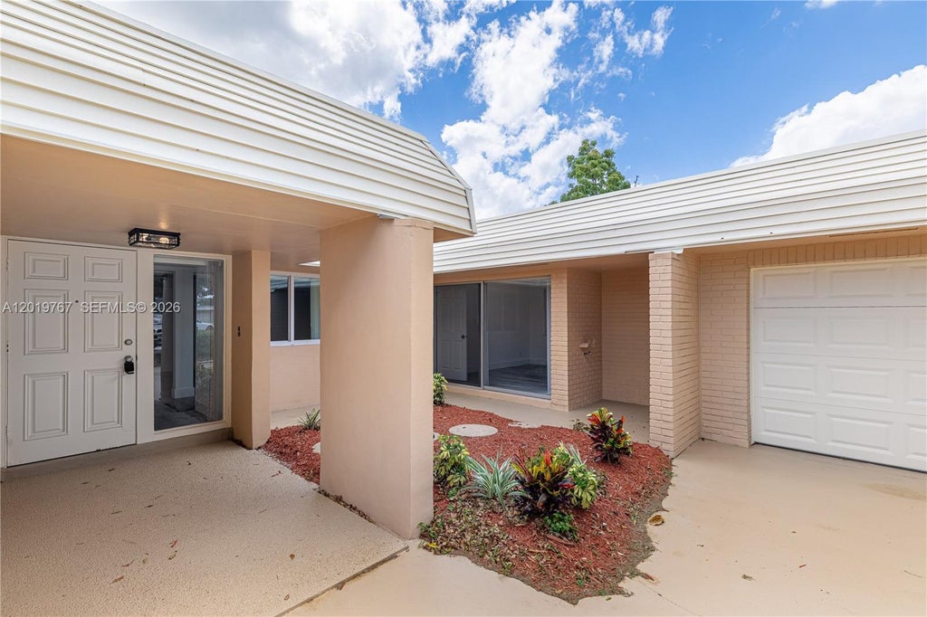 Photo of 5201 Yellow Pine Ln #0, Tamarac, FL 33319 (MLS # A12019767)