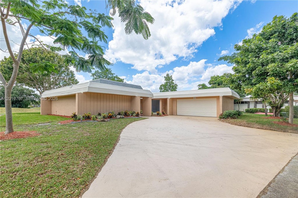 Photo of 5201 Yellow Pine Ln #0, Tamarac, FL 33319 (MLS # A12019767)