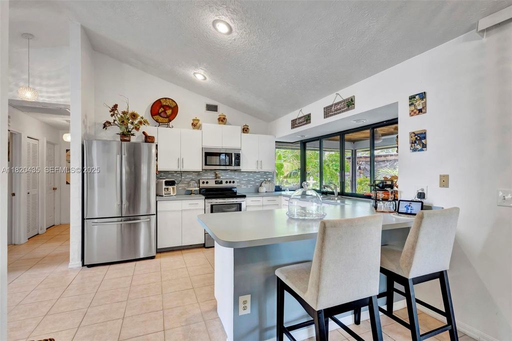 Photo of 502 SE Guava Ter, Port St Lucie, FL 34983 (MLS # A11820435)