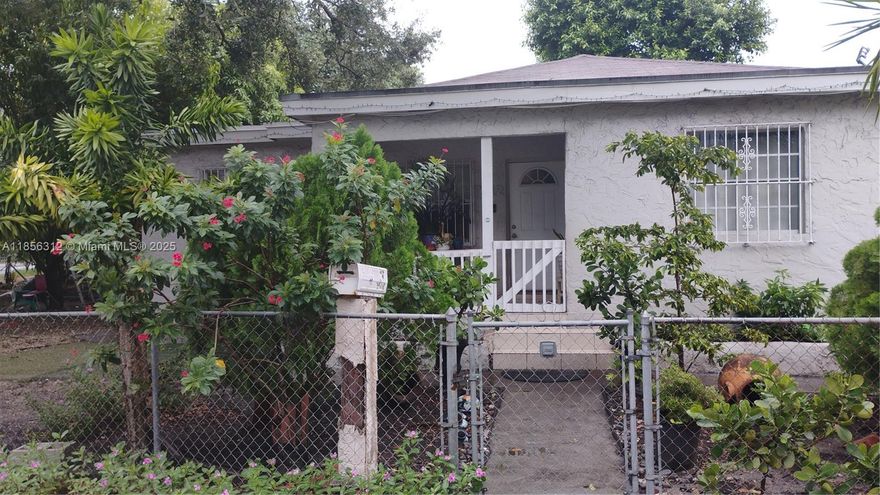 This lovely home features 4 bedrooms, 2 baths, and it also boasts additional room that can be a home office, home gym area, or even a 5th bedroom. The spacious kitchen features a stainless steel appliances, light and bright cabinets and counter top and is enhanced by natural light. Tiled and laminate flooring throughout the home so no need to worry about carpets ! Centrally located minutes to major roads, shops and yet, nestled in serene surroundings. Don't delay, make this home yours today ! Note: The adjacent property/vacant lot area is owned by Miami-Dade therefore it is not included in the sale of this property. Call listing agent for further details.