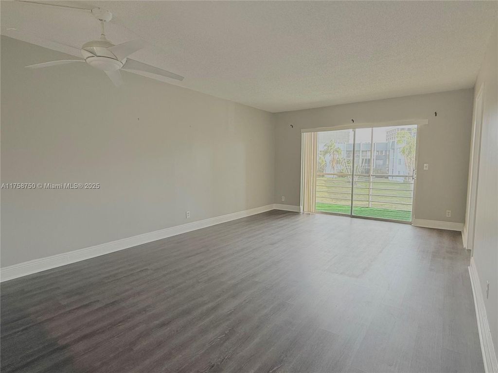 Photo of 1638 Embassy Dr #212, West Palm Beach, FL 33401 (MLS # A11758750)