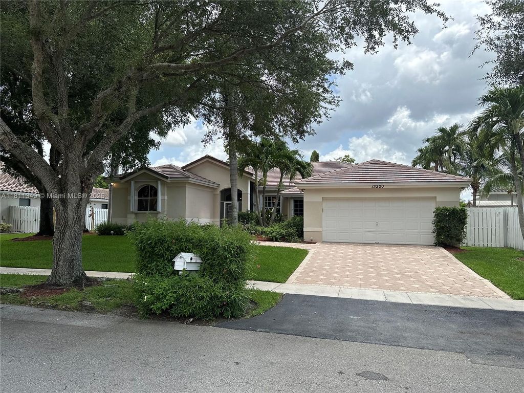 Photo of 13220 NW 11th Ct, Sunrise, FL 33323 (MLS # A11811349)