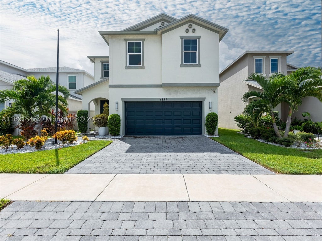 Photo of 1837 Lake Cove Dr, Lake Worth, FL 33460 (MLS # A11891547)
