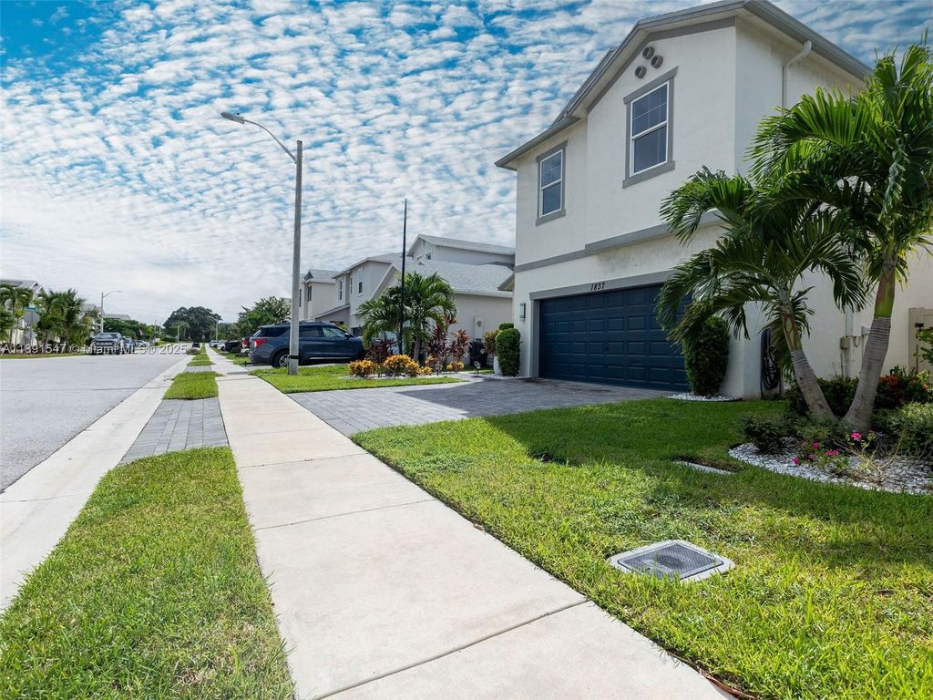 Photo of 1837 Lake Cove Dr, Lake Worth, FL 33460 (MLS # A11891547)