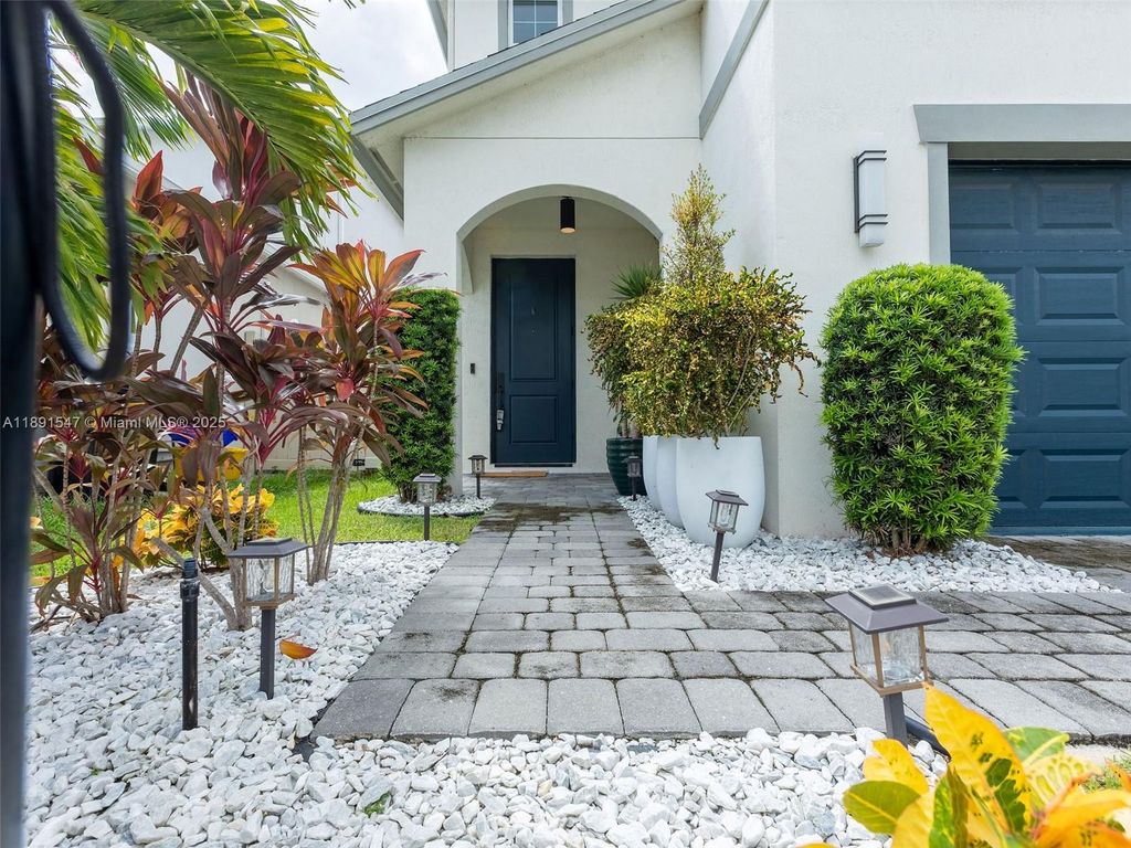 Photo of 1837 Lake Cove Dr, Lake Worth, FL 33460 (MLS # A11891547)