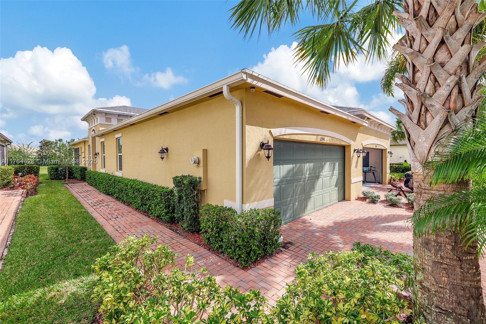 Beautifull Villa in LakePark at Tradition, the desirable 55+ Gated community, designed for relaxed yet vibrant living. Built in 2019, with a total of 2218 sf, 2 bedrooms, 2 bathrooms + a den/office that can easily be converted into a 3rd bedroom if desired. A spacious primary suite with a large walk-in closet, dual sinks, and a walk-in shower. Also features a Relaxing Screened Lanai, Volume Ceilings, Impact Windows & doors, laundry room & a 2-Car Garage. Enjoy access to two clubhouse complexes, pool, gym, tennis, pickleball, and basketball courts, dog park & more. Golf Cart-Friendly community for added ease & fun. Centrally located near shopping, restaurants, beaches & hospitals. HOA fee covers cable, alarm, Wi-Fi, lawn care, pest control, & tree trimming. Easy to show.
