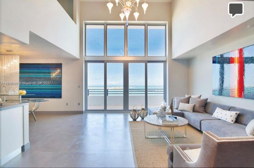 Boutique living in this beautiful two-story residence featuring spectacular, unobstructed views of the bay and ocean. Renovated and updated kitchen and bathrooms add modern comfort and style. Located in a small boutique building with only 66 units. Covered, gated parking included. Enjoy excellent building amenities, including a pool, BBQ area, gym, steam room, sauna, and guest parking. Prime location next to the Four Seasons and directly across from Saint Jude Church.