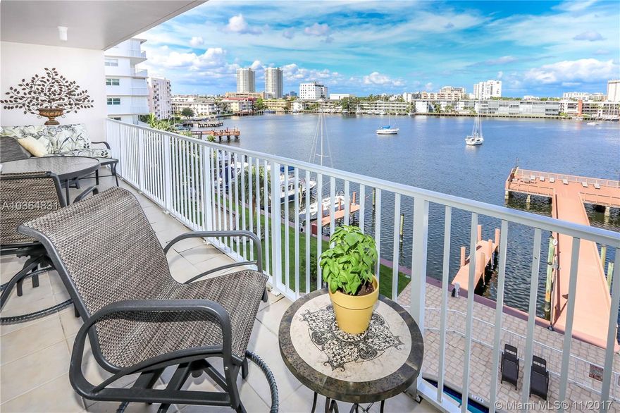 Wonderful, updated 2 bedroom/2 bathroom condo with views of lake and pool! Large kitchen with stainless steel appliances. Open living room and dining room. Hardwood floors throughout. Specious bedrooms with great closet space. Beautiful bathrooms with shower only and tub/shower. Huge balcony looks over Golden Isle Lake for an unbeatable view. Ample natural light. Ok to lease after two years. Close to beach, shopping and dining!