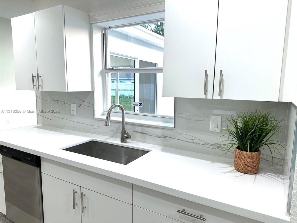 Photo of 1252 SW Porter Rd, Port Saint Lucie, FL 34953 (MLS # A11316356)