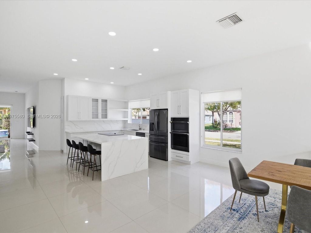 Photo of 14205 NW 21st St, Pembroke Pines, FL 33028 (MLS # A11975580)