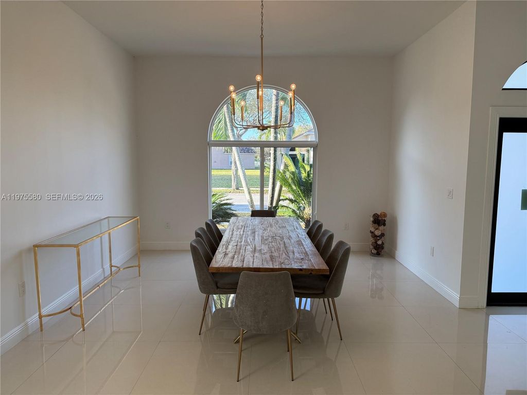 Photo of 14205 NW 21st St, Pembroke Pines, FL 33028 (MLS # A11975580)