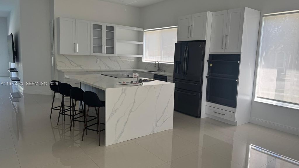 Photo of 14205 NW 21st St, Pembroke Pines, FL 33028 (MLS # A11975580)