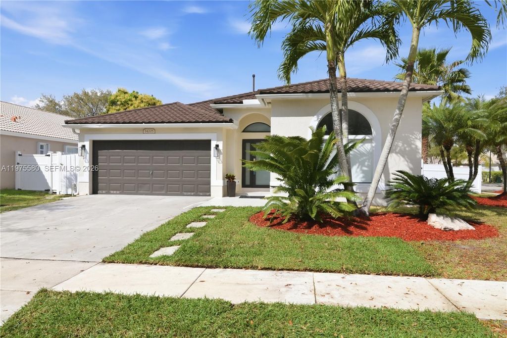 Photo of 14205 NW 21st St, Pembroke Pines, FL 33028 (MLS # A11975580)