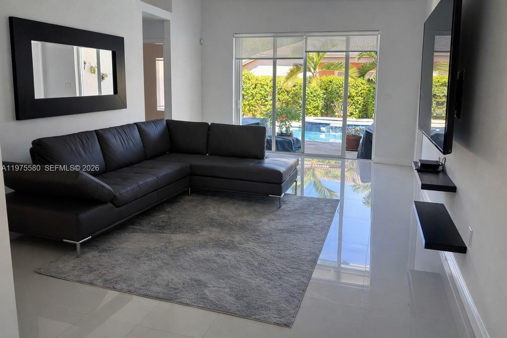 Photo of 14205 NW 21st St, Pembroke Pines, FL 33028 (MLS # A11975580)