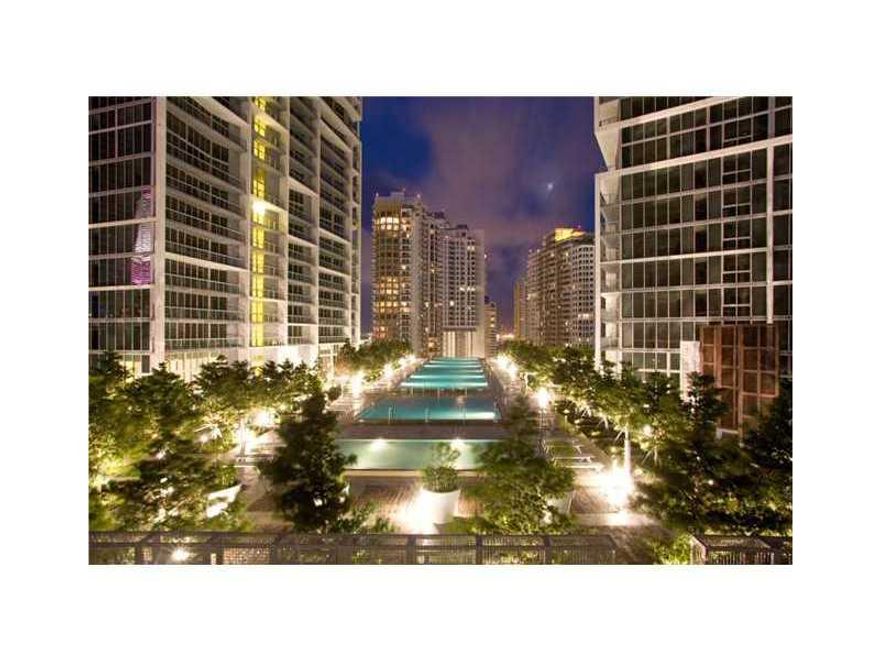 Back on market!!! 16 ft ceilings, gray travertine flooring, ample balcony with views of the river, downtown, and the port of Miami. One of a kind unit, a true gem!