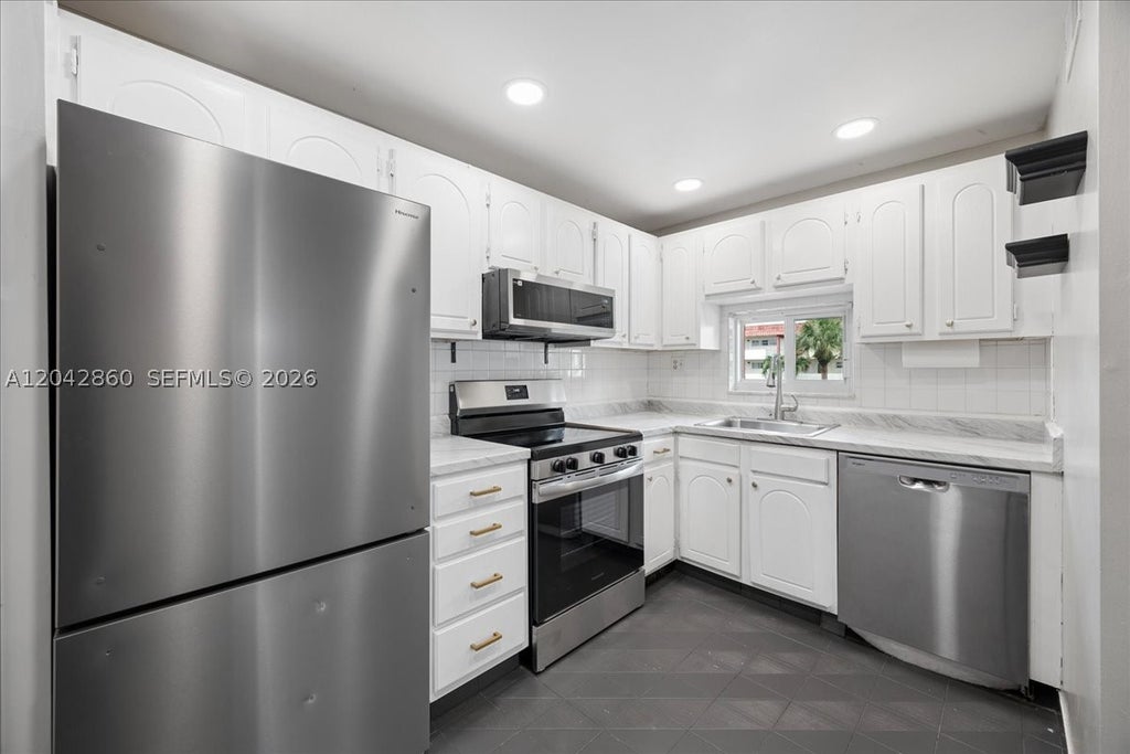 Photo of 800 S Hollybrook Dr #205, Pembroke Pines, FL 33025 (MLS # A12042860)