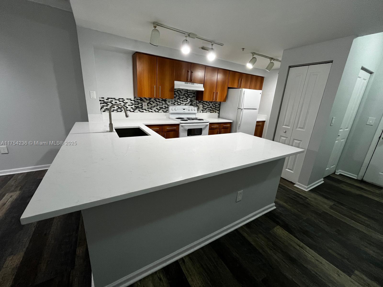 Property for Sale at 5900 W Sample Rd 303, Coral Springs, Broward County, Florida - Bedrooms: 3 
Bathrooms: 2  - $304,999
