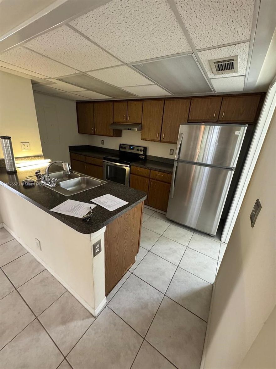 Beautiful 3-bedroom, 2-bathroom unit in the desirable gated community of Victoria Woods. This detached home features laminate wood floors and tile throughout, offering a modern and low-maintenance lifestyle. The spacious layout includes a washer and dryer conveniently located inside the unit. Enjoy the luxury of two garage parking spaces, perfect for added convenience and security. Situated close to major highways, parks, and top local amenities, this property combines comfort and accessibility. Perfect for families or those seeking a serene, well-connected home.
