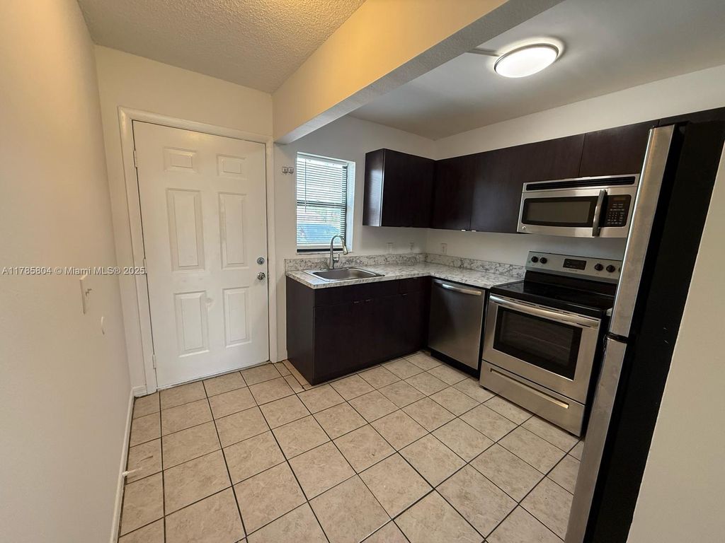 Photo of 617 Ixoria Ave #1, Fort Pierce, FL 34982 (MLS # A11785804)