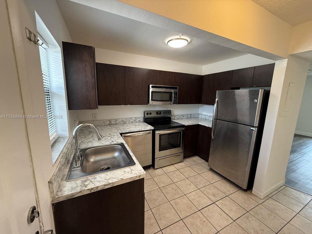 Photo of 617 Ixoria Ave #1, Fort Pierce, FL 34982 (MLS # A11785804)