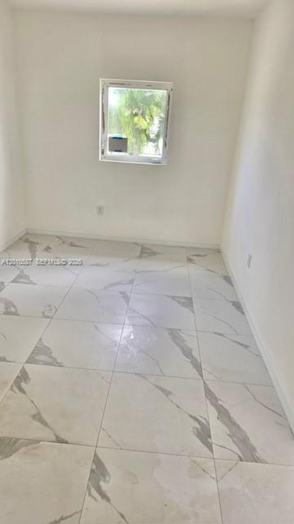 Photo of 1718 SW 57th Ave #1, West Park, FL 33023 (MLS # A12010587)