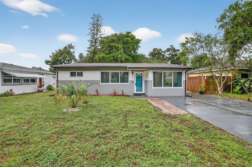 Completely renovated 3BD/2BA home on an oversized 8,300+ sq ft lot! Features impact windows/doors. 2025 A/C. Large master suite with updated bath & bidet, fresh interior/exterior paint, and an open-concept layout. Stunning kitchen features white cabinetry, granite countertops, stainless steel appliances, and bar top for entertaining. Enjoy new lighting fixtures & recessed lighting. Screened back porch. Huge driveway with paved side ideal for RV/boat storage. Centrally located between I-95 & 595, minutes to FLL Airport and beaches. Currently used as Airbnb—investors welcome! No HOA!