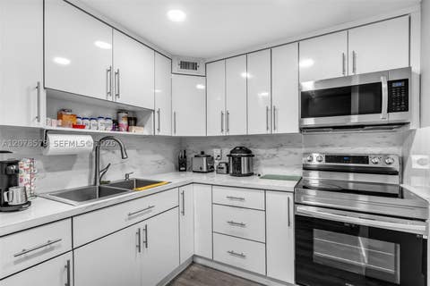 Tiny photo for 1825 W 44th Pl #401, Hialeah, FL 33012 (MLS # A12078579)
