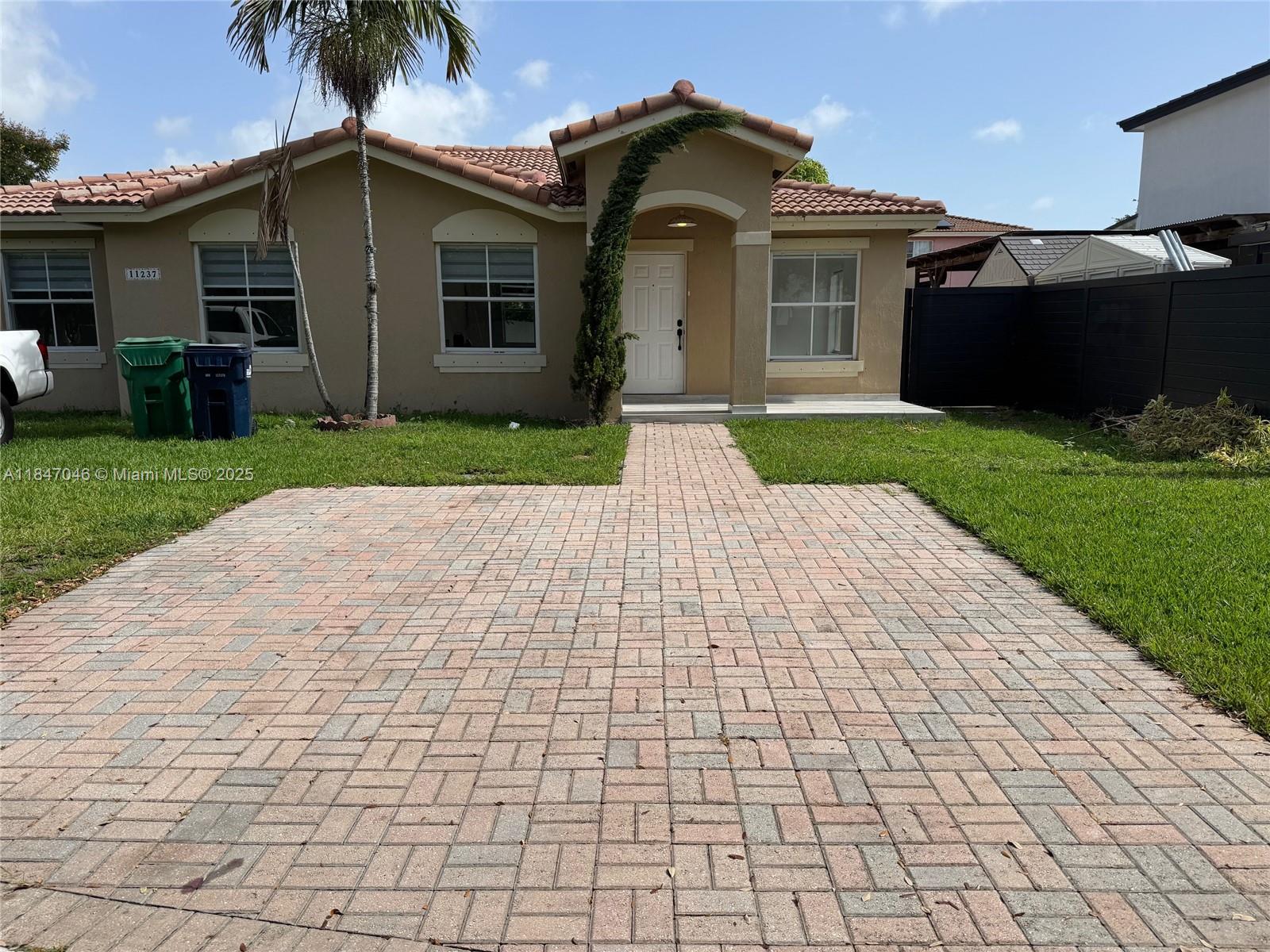 This beautiful home sits in a nice neighborhood. Completely renovated. ISLANDIA at Black Point Marina, near to Restaurants, shopping centers, Hospitals, great schools and more. Great location | Living area 1,730 Sqft | Lot 6,353 Sqft. Has 3 Bedrooms & 2 full Baths. Large family room | Brick pavers driveway & fenced patio | Tile floors throughout | 4 Parking spaces | NO HOA, no association approval required. INCLUDES ELECTRICITY, WATER & INTERNET. MOVE IN WITH FIRST MONTH RENT & SECURITY DEPOSIT. You will be able to extend your lease for many years. Pet allowed. Available now, for faster response please contact the listing Broker.