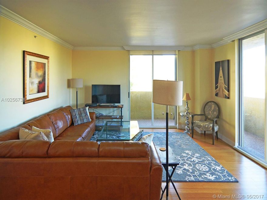 Wow -- what a great way to get into a wonderful full-amenity building in the prestigious South of 5th area! Turnkey and beautifully furnished and finished. Corner, split plan, 2/2, plenty of light, closet space, new washer/dryer, extra-large wrap around balcony, parking on same floor outside your door. Building features everything you need to enjoy resort living; fabulous new bay front pool, tennis courts, BBQ, gym, convenience store, valet and concierge. Will not last, call listing agent.