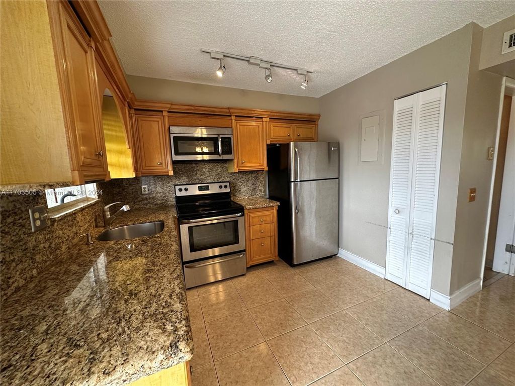 Photo of 1100 SE 4th Ave #32, Deerfield Beach, FL 33441 (MLS # A11703505)