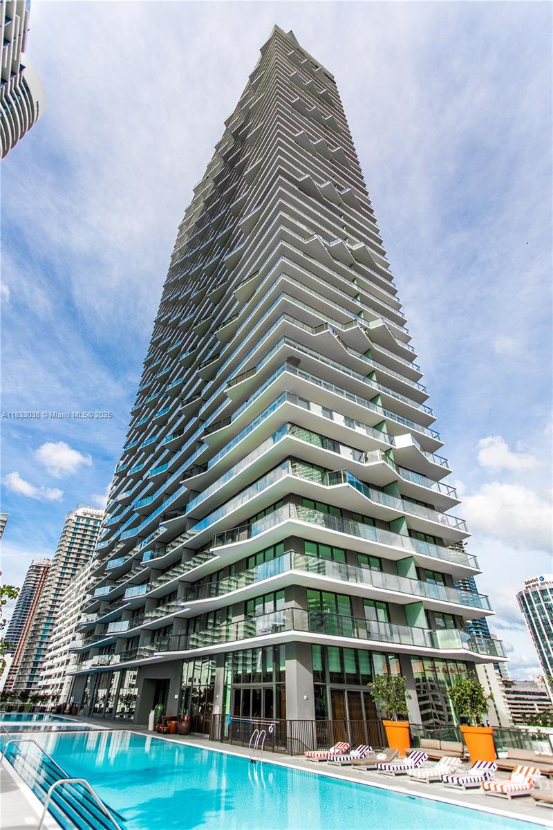 Live in the stylish 1300 S Miami Ave Condominium in this designer furnished 2 bedroom plus den corner wrap around residence with City views of Miami, Brickell and Coconut Grove. Great designer furnishings make the residence feel like a home. Enjoy resort style amenities with resident only roof top pool, high performance fitness center, spectacular spa services on site, private billiards room, private screening room and more. 24/7 concierge, valet, and roaming security. Assigned parking in the building. Live centrally located within minutes from grocery stores, shopping malls, movie theater, highway entrances in the heart of Miami's financial district, Brickell.