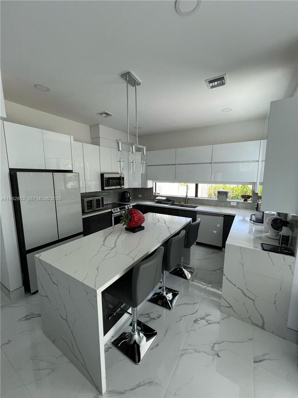 Photo of 2342 Mckinley St #3, Hollywood, FL 33020 (MLS # A11992863)