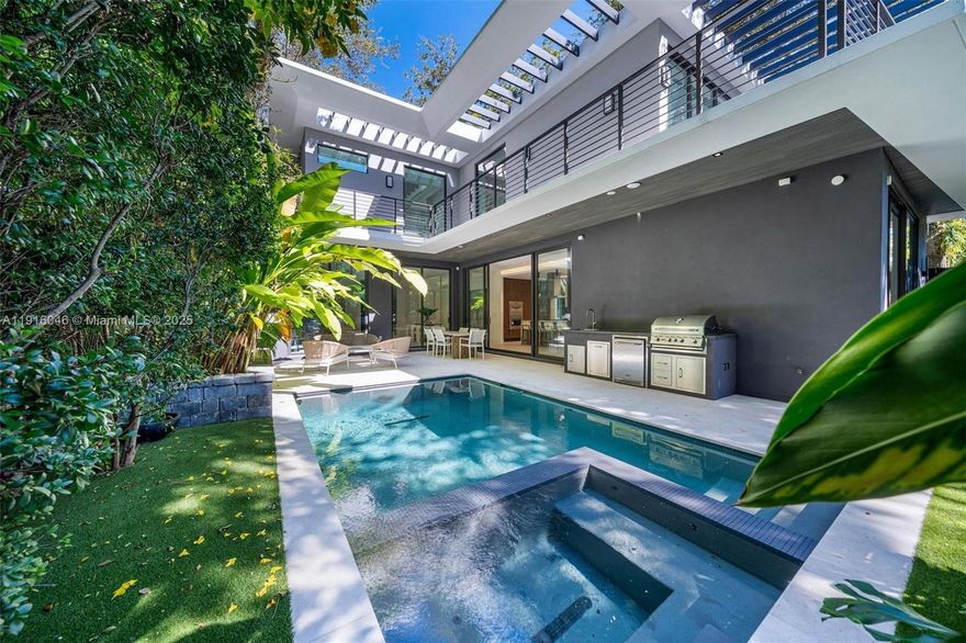 Villa di Luce Infinita is a love letter to Coconut Grove, where natural beauty and modern design live in perfect harmony. Bathed in golden light and surrounded by lush greenery, this newly built home reflects the soul of one of Miami’s most desirable neighborhoods. With 5 bedrooms, 6 bathrooms, two family rooms, laundry room, 13-foot ceilings, and an airy layout, every space feels alive with ease. The chef’s kitchen features premium appliances and gas stove, perfect for cooking and entertaining. Custom California closets elevate every suite. A serene outdoor oasis with a shimmering pool framed by tropical foliage. Set in the best pocket of Coconut Grove, close to charming streets, top schools, and parks, Villa di Luce Infinita is a sanctuary of peace, light, and elegance. Easy to show!