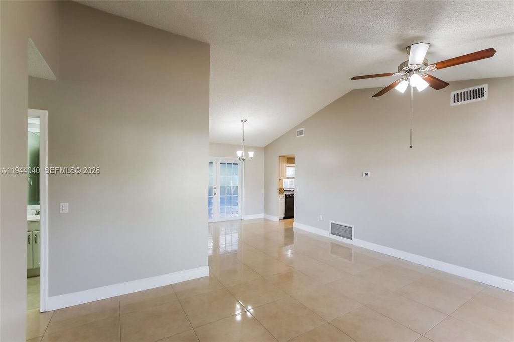 Photo of 8410 NW 27th Pl, Sunrise, FL 33322 (MLS # A11944040)