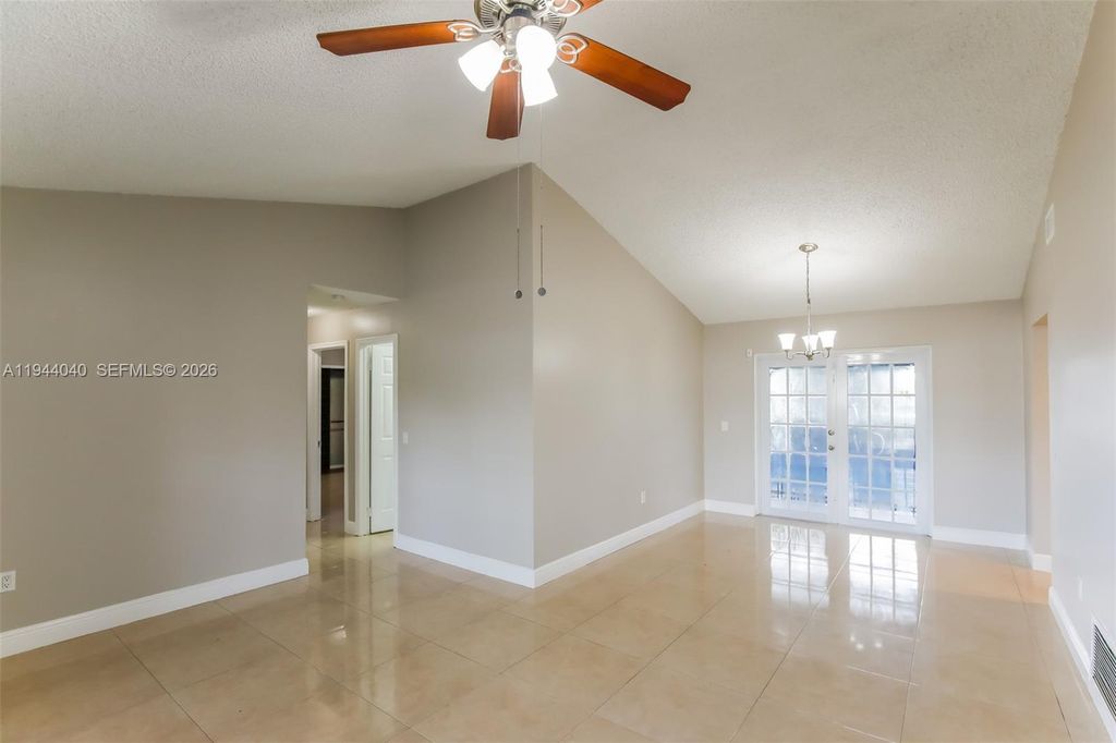 Photo of 8410 NW 27th Pl, Sunrise, FL 33322 (MLS # A11944040)