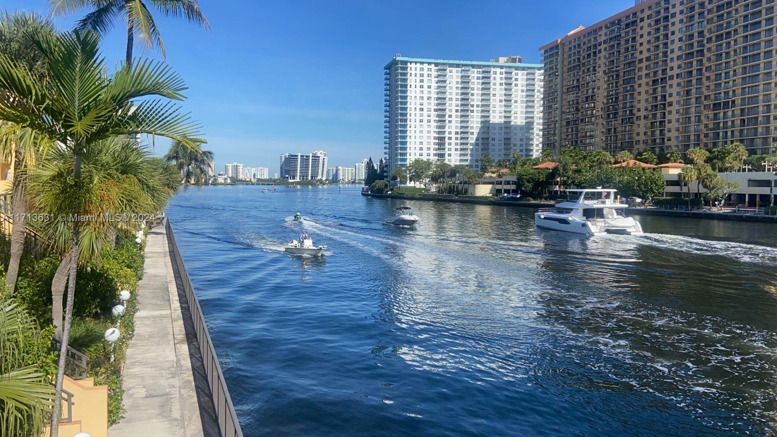 24/7 guard gated community of Eastern Shores. Overlooking the Intracoastal Waterway, Beautiful residence gated and comes fully furnished with 2 bedrooms, 2 ½ baths, 2 covered parking spaces. Additional features include marvel floors stainless rust proof appliances, washer & dryer in unit, large patio and open balcony with direct water views. Great community with billiard room, swimming pool, sauna, exercise room and plenty of guest parking. The building is undergoing updates. Located within minutes from shopping mall, top rated schools, I-Pic Theater, fine dining, Sunny Isles Beach and Oleta River State Park. Ready to move in.