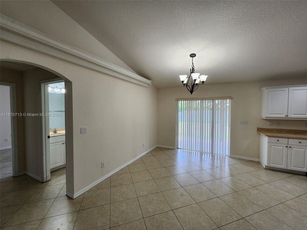 Photo of 1010 SW Mataro Ave, Port Saint Lucie, FL 34953 (MLS # A11670713)