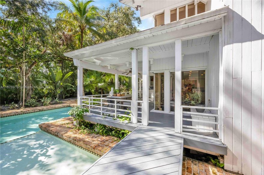 Great opportunity to remodel existing house or custom build on this lush 31,272 square foot lot in the prestigious gated community of Snapper Creek Oaks.  This unique property was designed by local architect John Weller and boasts a "tree house" feeling.